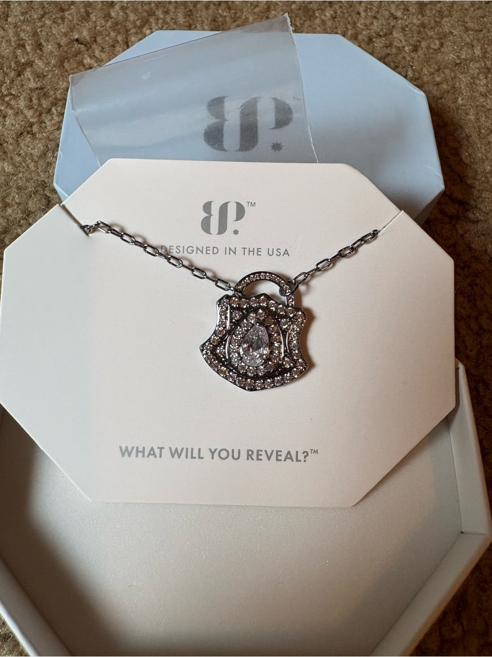 Delicate Silver-Tone Shield Pendant Necklace with Crystal Accents